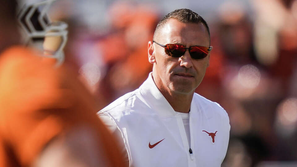 Texas Longhorns head coach Steve Sarkisian walks the field as Texas warms up ahead of the Longhorns' game against the Arkansas Razorbacks at Darrell K Royal Texas Memorial Stadium in Austin, Nov. 22, 2025.
