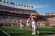 Texas Longhorns quarterback Arch Manning (16) embraces Texas Longhorns offensive lineman Connor Robertson (62) ahead of the Longhorns’ game against the Arkansas Razorbacks at Darrell K Royal Texas Memorial Stadium in Austin, Nov. 22, 2025.
