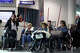 Travelers in wheelchairs wait to preboard a Southwest Airlines flight to Phoenix at Oakland San Francisco Bay Airport on Tuesday.
