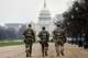 National Guard patrol along the National Mall in front of the Capitol, Wednesday, Nov. 26, 2025, in Washington.