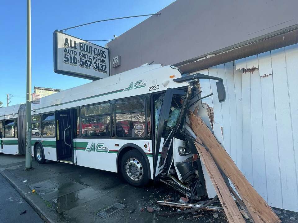 AC Transit bus crashes into Oakland building, injuring 11 people