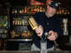 Director of operations Christian Hawkins makes a drink at Clive Bar, the longest-standing bar on Rainey Street in Austin, Tuesday, Dec. 2, 2025.