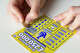 The Texas Lottery is warning parents to not give children scratch-off lottery tickets as gifts they could find in their stocking. (Photo by: Alex Segre/UCG/Universal Images Group via Getty Images)