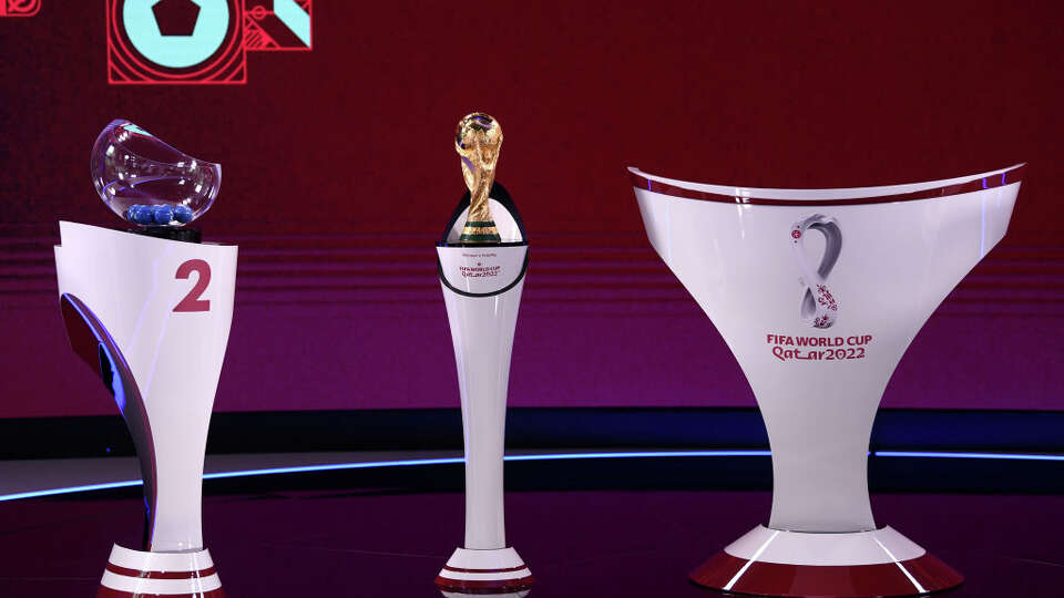 FILE: FIFA World Cup trophy and lottery balls are seen ahead of final preparations for the 2022 FIFA World Cup draw at Doha Exhibition and Convention Center in Doha, Qatar on April 01, 2022.