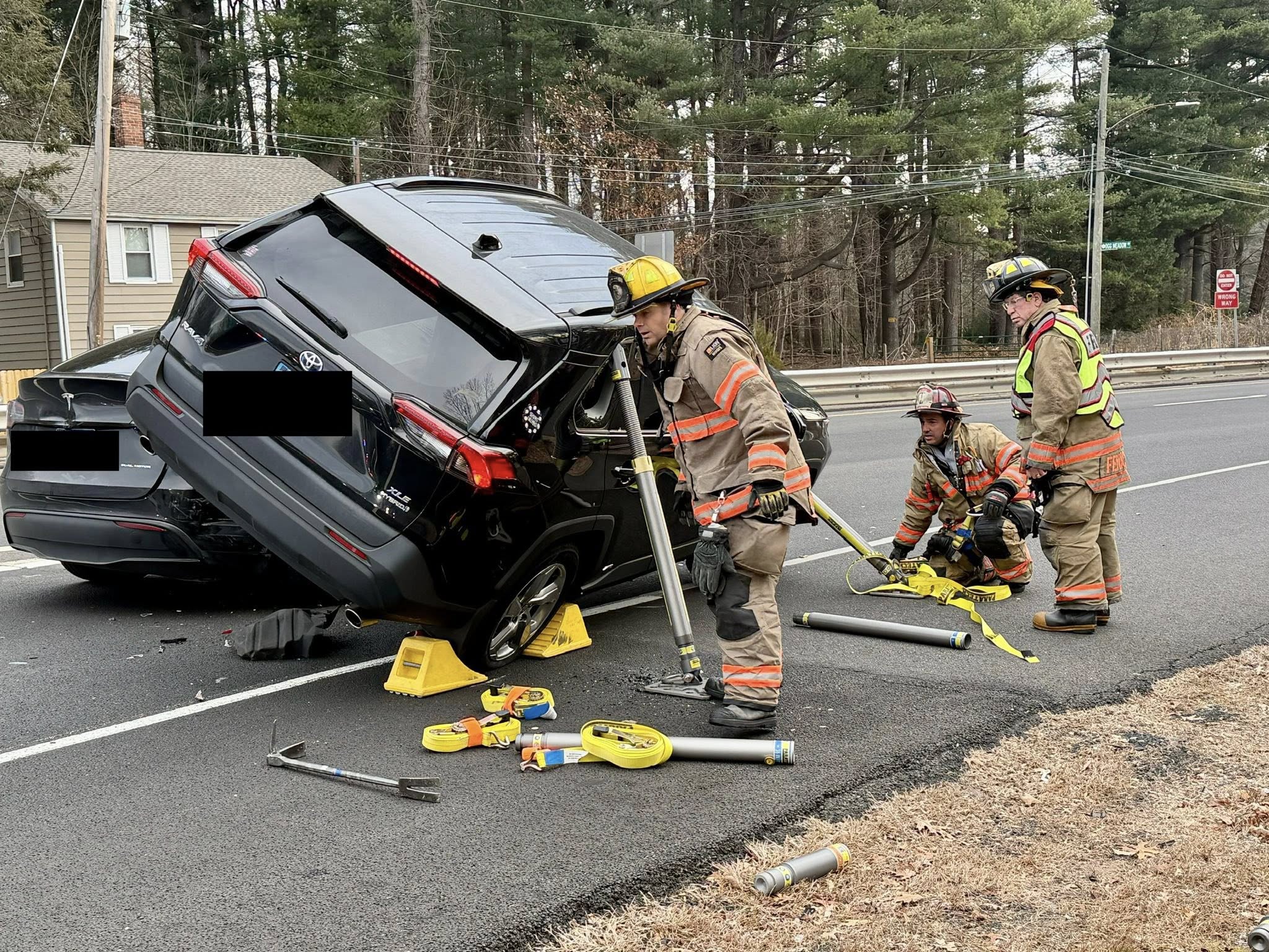 Orange firefighters free person trapped in car after Route 15 crash