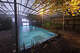 A pool in a greenhouse at Heydalur guesthouse in Iceland’s Westfjords.