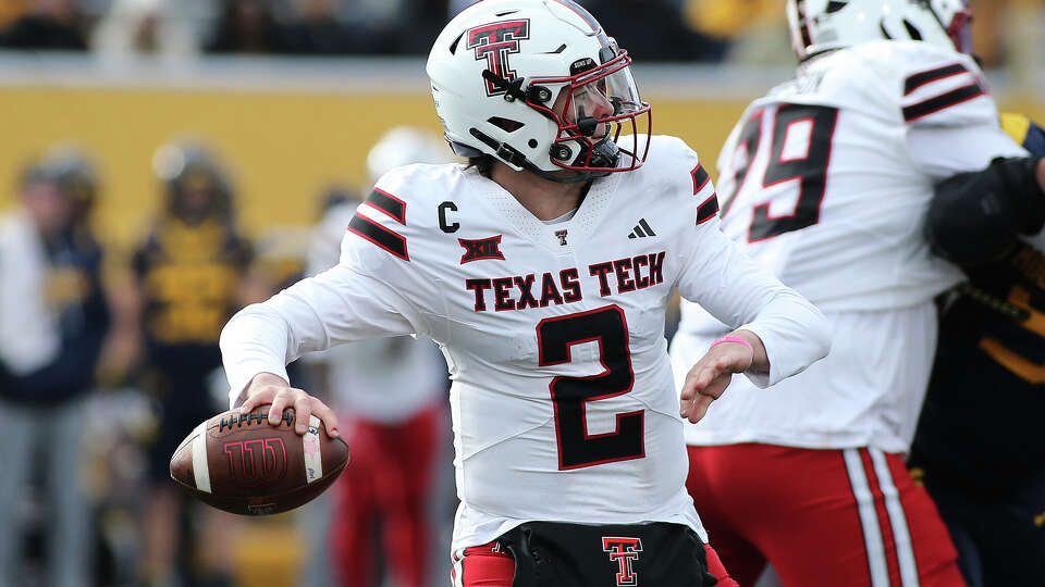 Texas Tech quarterback Behren Morton (2) passes against West Virginia during the second half of an NCAA college football game Saturday, Nov. 29, 2025, in Morgantown, W.Va.