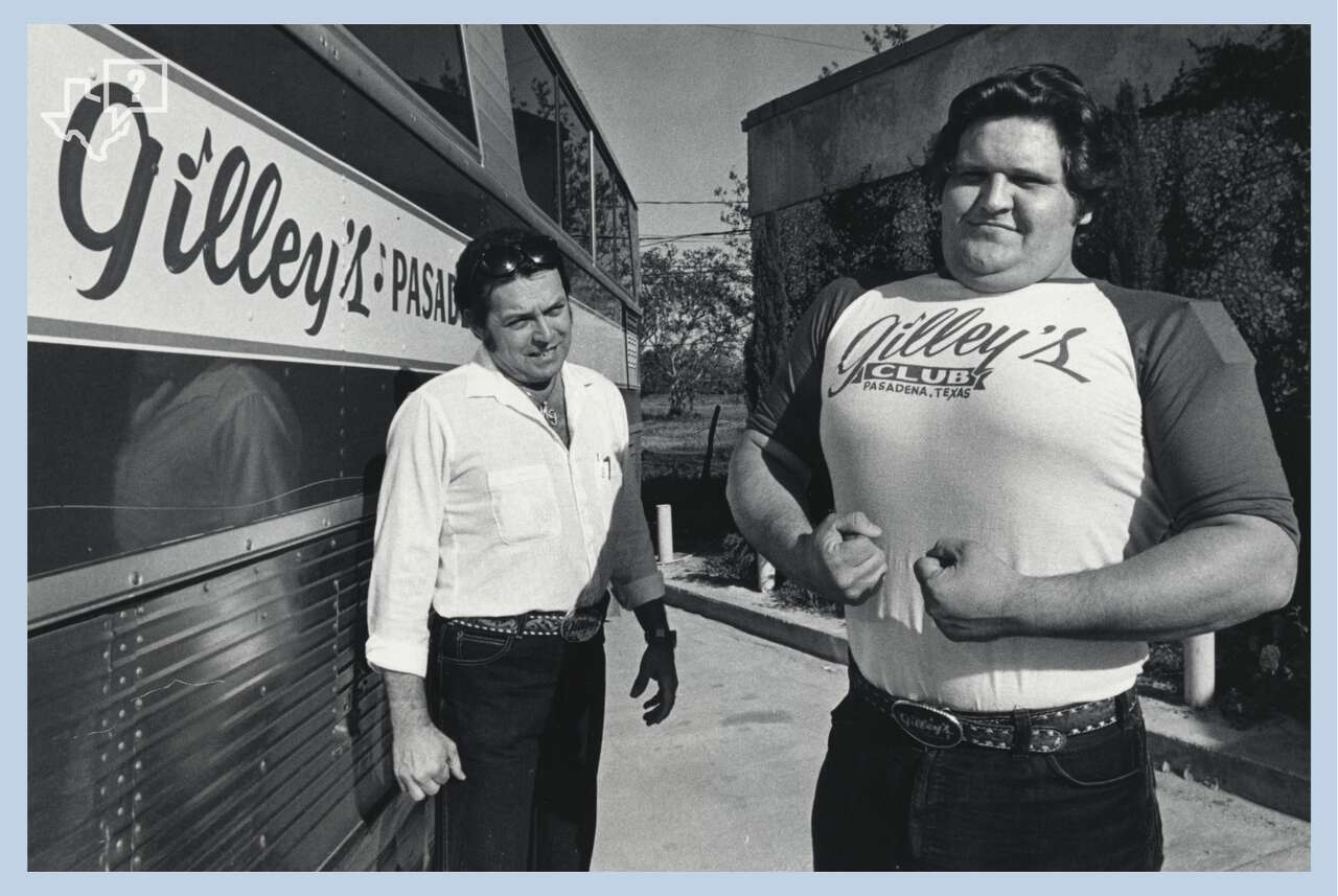 Mickey Gilley, left, with 'Killer' David Ogle, Gilley's Club bouncer who was featured in the movie 'Urban Cowboy,' photographed in April 1980.