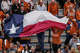 Fans wave a Texas flag as The Longhorns take on Florida A&M during the first round of the NCAA Tournament at Gregory Gymnasium in Austin, Friday, Dec. 5, 2025.