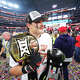 Texas Tech linebacker Ben Roberts celebrates walks on the field after being awared the Most Outstanding Player trophy following the team's win in the Big 12 Conference championship NCAA college football game against BYU Saturday, Dec. 6, 2025, in Arlington, Texas. (AP Photo/Julio Cortez)