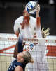 Texas Longhorns outside hitter Abby Vander Wal (6) puts the ball over as Penn State Nittany Lions setter Addie Lyon (7) reaches to defend during the first set between Texas and the Nittany Lions in the second round of the DI NCAA Volleyball Tournament, Dec 6, 2025 in the Gregory Gymnasium.
