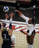 Texas Longhorns outside hitter Torrey Stafford (4) hits the ball over the net during the first set between Texas and the Penn State Nittany Lions in the second round of the DI NCAA Volleyball Tournament, Dec 6, 2025 in the Gregory Gymnasium.