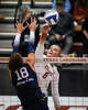 Texas Longhorns outside hitter Abby Vander Wal (6) sends the ball over as Penn State Nittany Lions right side hitter Kennedy Martin (18) defends during the first set between Texas and the Nittany Lions in the second round of the DI NCAA Volleyball Tournament, Dec 6, 2025 in the Gregory Gymnasium.