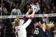Texas A&M outside hitter Emily Hellmuth (4) is blocked by TCU setter Ella Foti (20) during the NCAA Division I volleyball playoff game at Reed Arena on Saturday, Dec. 6, 2025 in College Station, Texas.