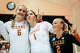 Texas Longhorns outside hitter Abby Vander Wal (6) sings “The Eyes of Texas” with setter Ella Swindle (1) and libero Emma Halter (2) after sweeping the Penn State Nittany Lions in the second round of the DI NCAA Volleyball Tournament, Dec 6, 2025 in the Gregory Gymnasium.