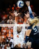 Texas Longhorns outside hitter Torrey Stafford (4) leaps to block an attempt from Penn State Nittany Lions middle blocker Jordan Hopp (5) in the second set of the Longhorns’ 3-0 win over the Nittany Lions in the second round of the DI NCAA Volleyball Tournament, Dec 6, 2025 in the Gregory Gymnasium.
