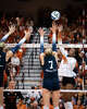 Texas Longhorns outside hitter Torrey Stafford (4) puts the ball over the net as Penn State Nittany Lions setter Addie Lyon (7) defends in the second set of the Longhorns’ 3-0 win over the Nittany Lions in the second round of the DI NCAA Volleyball Tournament, Dec 6, 2025 in the Gregory Gymnasium.