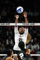 Texas A&M middle blocker Morgan Perkins (21) tips the ball during the NCAA Division I volleyball playoff game against TCU at Reed Arena on Saturday, Dec. 6, 2025 in College Station, Texas.