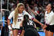 Texas A&M middle blocker Morgan Perkins (21) celebrates a score during the NCAA Division I volleyball playoff game against TCU at Reed Arena on Saturday, Dec. 6, 2025 in College Station, Texas.