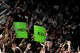 Texas A&M fans hold up signs after a block during the NCAA Division I volleyball playoff game against TCU at Reed Arena on Saturday, Dec. 6, 2025 in College Station, Texas.