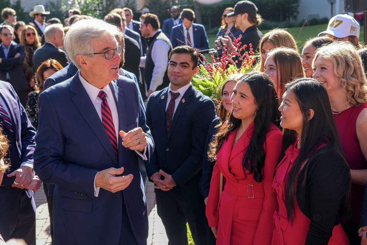 Texas Lieutenant Governor Dan Patrick talks to Turning Point USA chapter students ahead of a press conference at the Governor's Mansion on Monday, Dec. 8, 2025 in Austin.