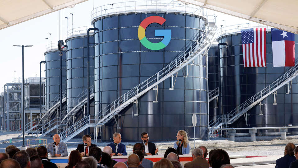Alphabet and Google CEO Sundar Pichai, second from right, speaks during a news conference to announce Google's $40 billion investment in Texas on Friday, Nov. 14, 2025, in Midlothian. U.S. Rep. Jake Ellzey, from left, U.S. Deputy Secretary of Energy James Danly, Texas Gov. Greg Abbott, and Amanda Peterson Corio, global head of data center energy at Google, listen.