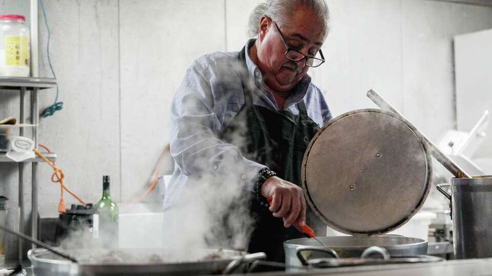 Executive Chef and owner Arnaldo Richards cooks tamales in the kitchen at Picos restaurant as the longtime Houston institution prepares for its final tamale season before closing, in Houston, Tuesday, Dec. 9, 2025.