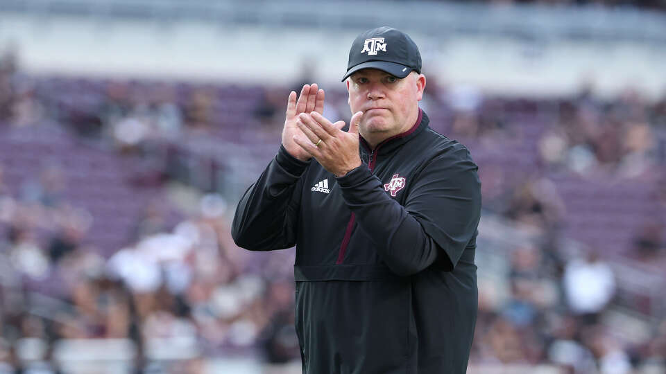 Defensive coordinator Jay Bateman looks on prior to the game against the Mississippi State Bulldogs at Kyle Field in College Station, Texas. Bateman will serve as Kentucky's defensive coordinator next season.