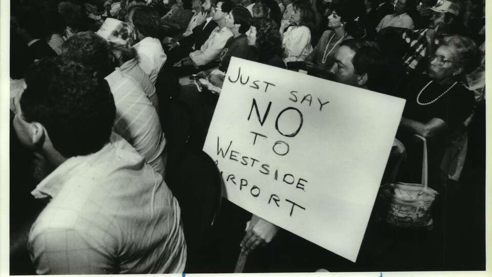 Opponents of the proposed Westside Airport in Houston, Texas meet...Rob Thacker displays his sentiments in the jammed auditorium at Katy High School in Katy, Texas, where public hearing on planned Westside Airport took place.