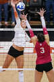 Texas Longhorns middle blocker Ayden Ames (5) spikes the ball as Texas volleyball plays Indiana in a Sweet 16 NCAA Tournament match in Gregory Gymnasium in Austin, Friday, Dec. 12, 2025. The Longhorns will advance to Elite Eight with a 3-0 win.