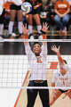 Texas Longhorns outside hitter Cari Spears (23) jumps to block a spike as Texas volleyball plays Indiana in a Sweet 16 NCAA Tournament match in Gregory Gymnasium in Austin, Friday, Dec. 12, 2025. The Longhorns will advance to Elite Eight with a 3-0 win.