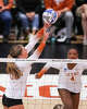 Texas Longhorns setter Ella Swindle (1) sets up her teammate for a hit as Texas volleyball plays Indiana in a Sweet 16 NCAA Tournament match in Gregory Gymnasium in Austin, Friday, Dec. 12, 2025. The Longhorns will advance to Elite Eight with a 3-0 win.