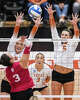 Texas Longhorns outside hitter Abby Vander Wal (6) and Texas Longhorns middle blocker Ayden Ames (5) jump to block a hit from Indiana Hoosiers outside hitter Candela Alonso-Corcelles (3) as Texas volleyball plays Indiana in a Sweet 16 NCAA Tournament match in Gregory Gymnasium in Austin, Friday, Dec. 12, 2025. The Longhorns will advance to Elite Eight with a 3-0 win.