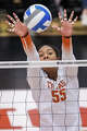 Texas Longhorns middle blocker Nya Bunton (55) blocks a hit as Texas volleyball plays Indiana in a Sweet 16 NCAA Tournament match in Gregory Gymnasium in Austin, Friday, Dec. 12, 2025. The Longhorns will advance to Elite Eight with a 3-0 win.