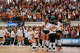 The Longhorns celebrate defeating Indiana in a Sweet 16 NCAA Tournament match in Gregory Gymnasium in Austin, Friday, Dec. 12, 2025. The Longhorns will advance to Elite Eight with a 3-0 win.