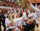 The Longhorns celebrate defeating Indiana in a Sweet 16 NCAA Tournament match in Gregory Gymnasium in Austin, Friday, Dec. 12, 2025. The Longhorns will advance to Elite Eight with a 3-0 win.