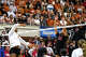 Texas Longhorns outside hitter Torrey Stafford (4) spikes the ball during the NCAA Regional Final volleyball match against Wisconsin at Gregory Gym on Sunday, Dec. 14, 2025 in Austin.