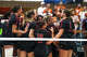 Wisconsin players cheer immediately after the defeat of the Texas Longhorns in the NCAA Regional Final volleyball match at Gregory Gym on Sunday, Dec. 14, 2025 in Austin.