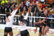 Texas Longhorns outside hitter Cari Spears (23) and middle blocker Nya Bunton (55) block a spike by Wisconsin outside hitter Mimi Colyer (15) during the NCAA Regional Final volleyball match at Gregory Gym on Sunday, Dec. 14, 2025 in Austin.