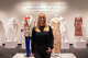 Jessica Ciarla, University of Texas associate professor of instruction and the educational director for this lab, stands in her exhibit, the “Particles of Color: Where Science Meets Fashion” at the Texas Science and Natural History Museum in Austin, Thursday, Dec. 11, 2025.
