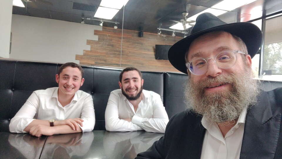 Houston Chabad Rabbi Chaim Lazaroff with his nephews Leibel and Lazer Lazaroff in 2022. Leibel was shot in a terror attack on a Hanukkah celebration in Bondi Beach, Australia in 2025.  