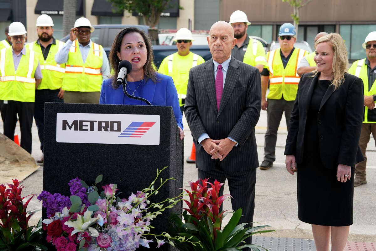Metropolitan Transit Authority Chairwoman Elizabeth Gonzalez Brock speaks at a groundbreaking ceremony flanked by Houston Mayor John Whitmire and Council Member Mary Nann Huffman in May 2024. 