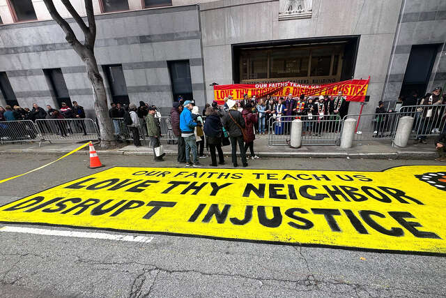 Bay Area faith leaders chain themselves outside SF ICE field office