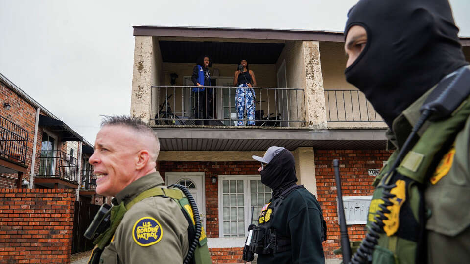 NEW ORLEANS, LOUISIANA - DECEMBER 5: U.S. Chief Border Patrol Agent, Gregory Bovino and other agents conduct an immigration enforcement operation in a neighborhood on December 5, 2025 in New Orleans, Louisiana This comes on the third day of the operation in Louisiana, 'Catahoula Crunch,' launched by the Department of Homeland Security as a part of an immigration crackdown on undocumented immigrants in the United States. (Photo by Ryan Murphy/Getty Images)
