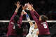 Texas A&M Aggies middle blocker Ifenna Cos-Okpalla (1) and opposite Logan Lednicky (9) close the block in the first set of a semifinal match between the Texas A&M Aggies and Pittsburgh Panthers in the NCAA Tournament on Dec. 18, 2025 at T-Mobile Arena in Kansas City, MoTexas A&M volleyball vs Pittsburgh