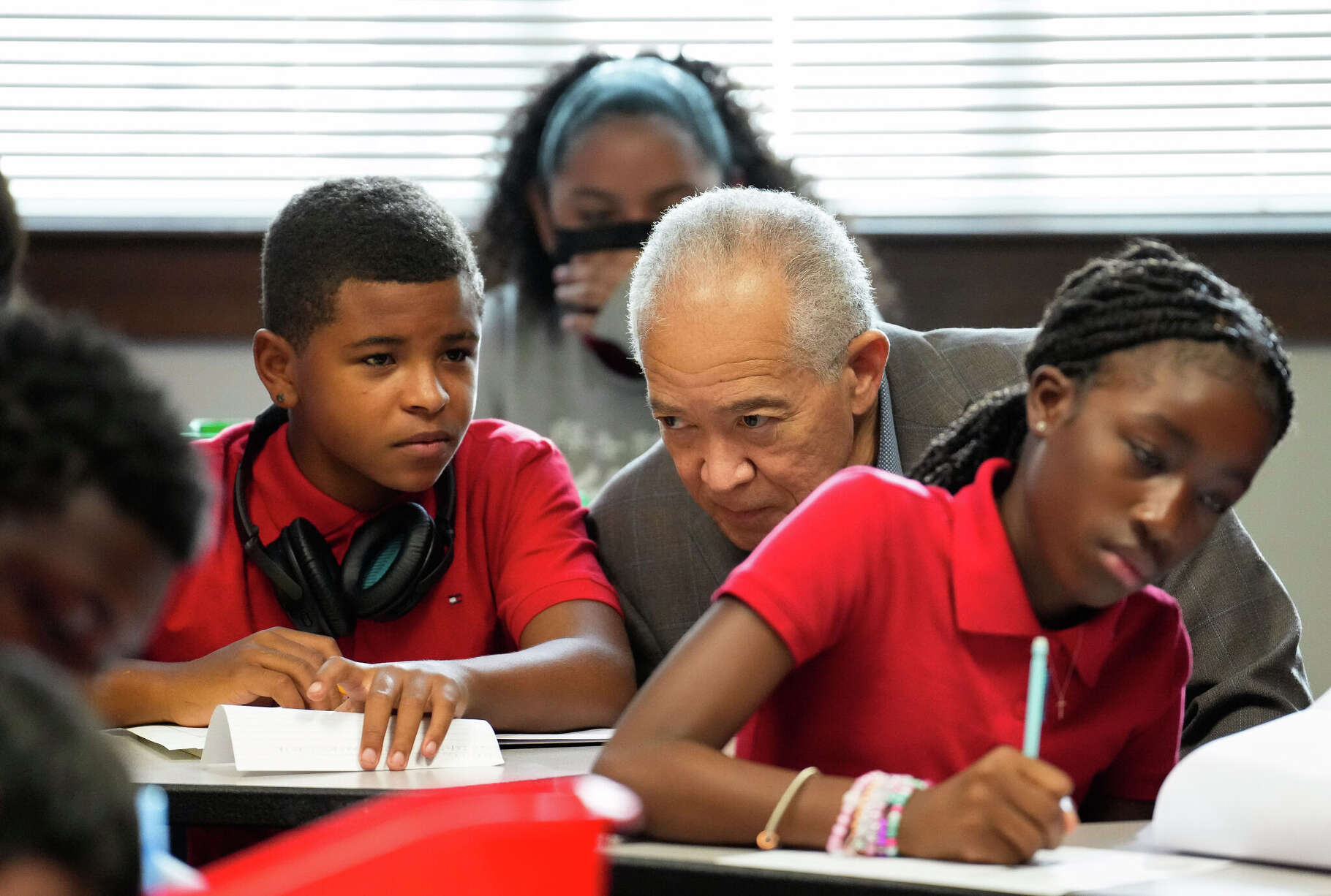 Houston Independent School District Superintendent Mike Miles talks to a Audrey H. Lawson Middle School student while visiting classes Wednesday, Sept. 6, 2023 in Houston.