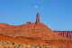 Rising moon over the Castleton Tower, or Castle Rock, viewed from Castle Valley, Utah.