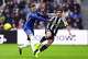 Sandro Tonali of Newcastle and Cole Palmer of Chelsea fight for the ball during a Premier League match on Saturday, December 20, 2025. (Owen Humphreys/PA via AP)