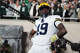 El mariscal de campo de Michigan, Bryce Underwood, celebra después de anotar un touchdown durante la primera mitad de un partido de fútbol americano universitario de la NCAA contra Michigan State el sábado 25 de octubre de 2025 en East Lansing, Michigan.