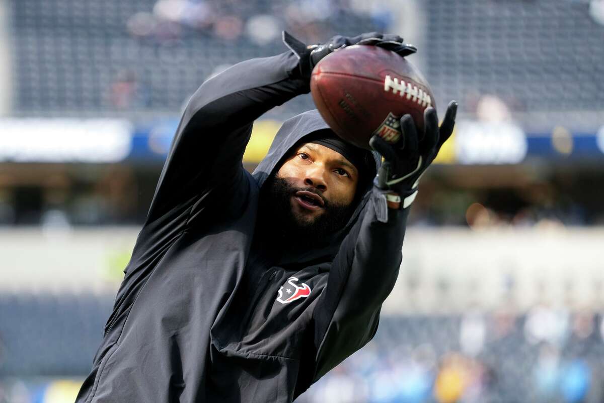 Houston Texans wide receiver Nico Collins (12) catches a pass before an NFL football game in Inglewood, Calif., Saturday, Dec. 27, 2025.